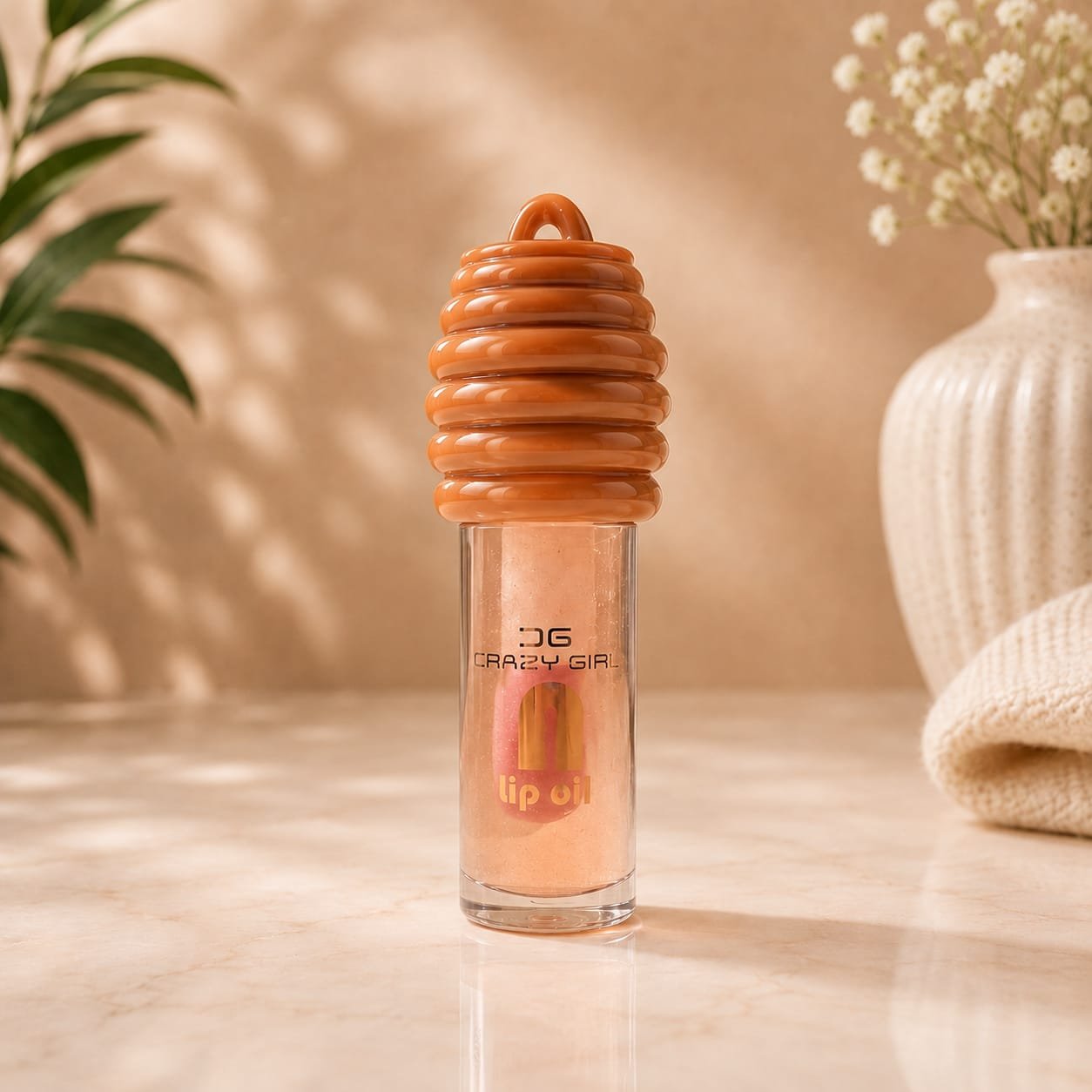Waterproof lip oil with honeycomb-shaped cap.
