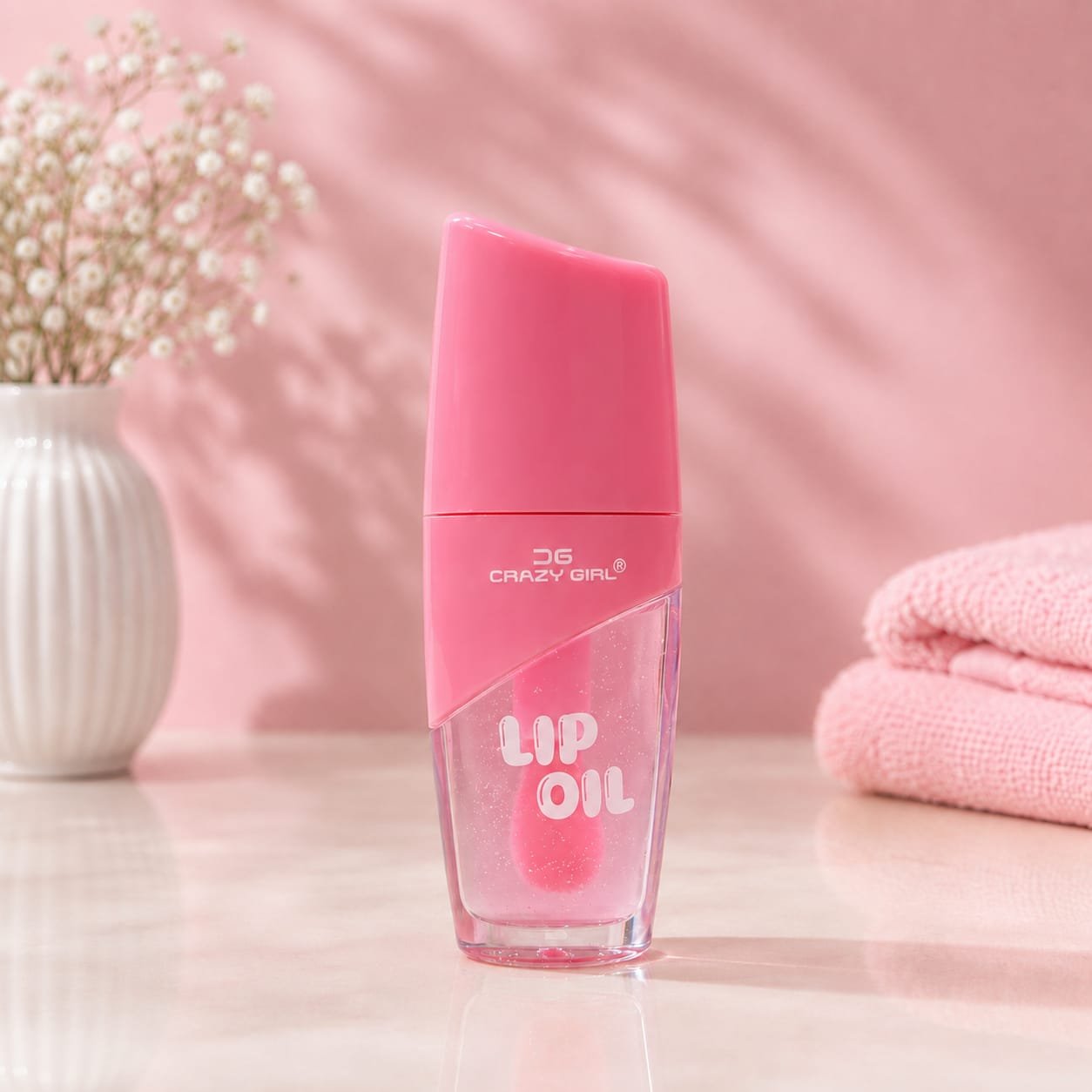 Color-changing lip oil designed for a glossy, hydrating finish.