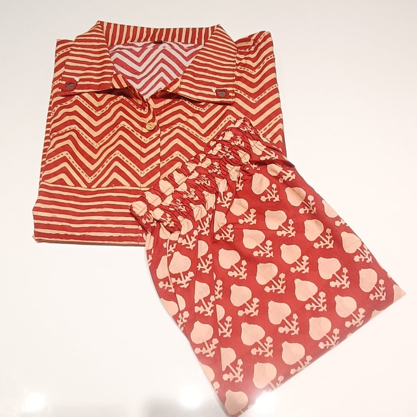 Ethnic co-ord set features a vibrant combination of traditional Indian prints and modern comfort.