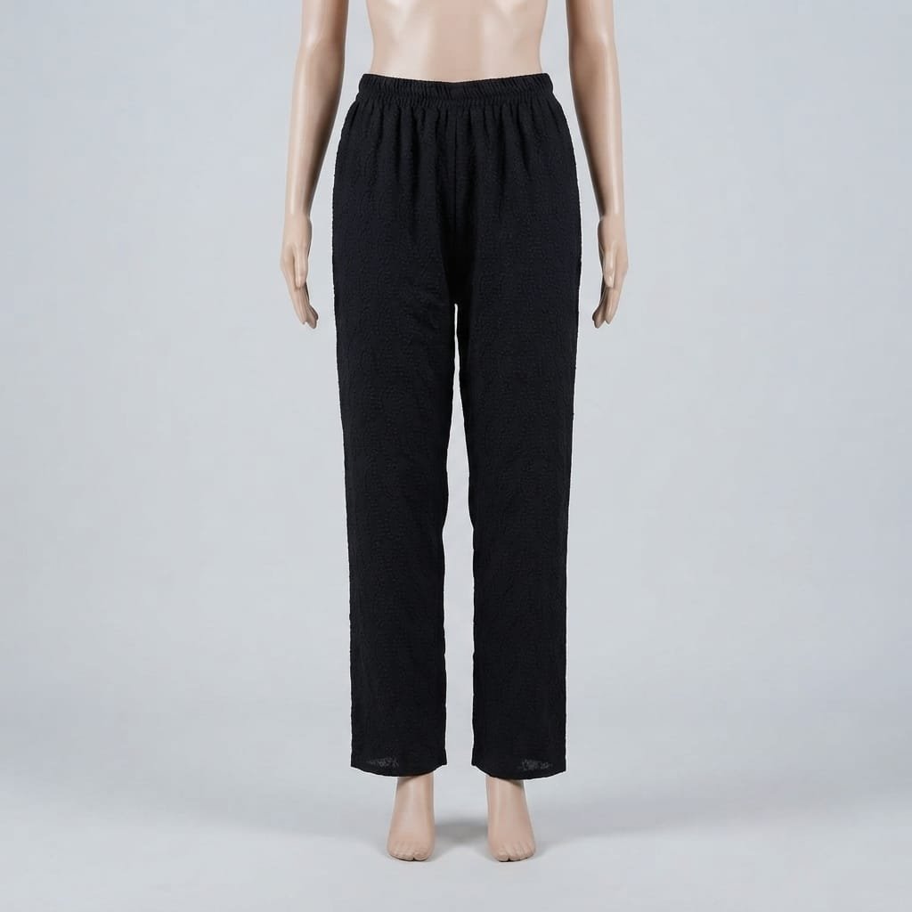 A pair of Cut Loose Cropped Pants with Darts in a solid black color.