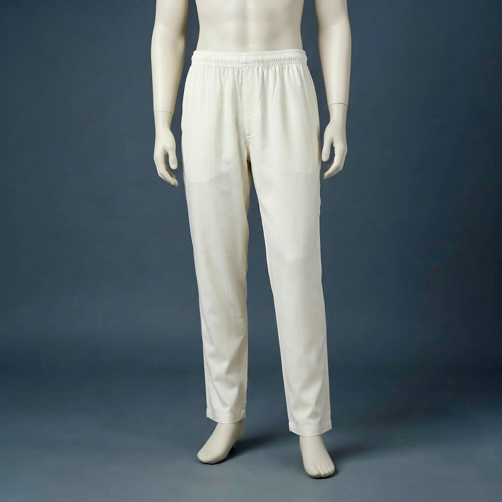 Vastramay cream-colored cotton pajama pants feature a comfortable elasticized waistband with a drawstring closure.