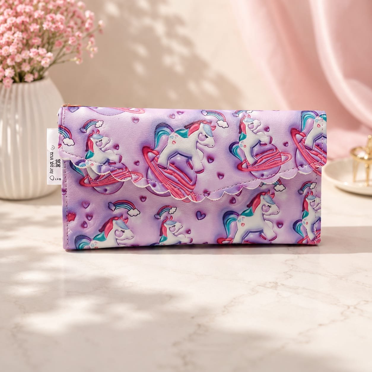 Long, multi-compartment unicorn-themed wallet